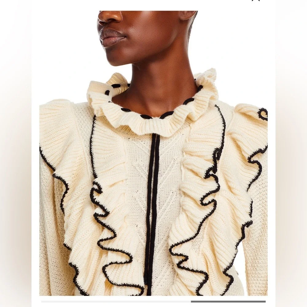 Stellah Ivory Sweater with Black Ruffle Accents